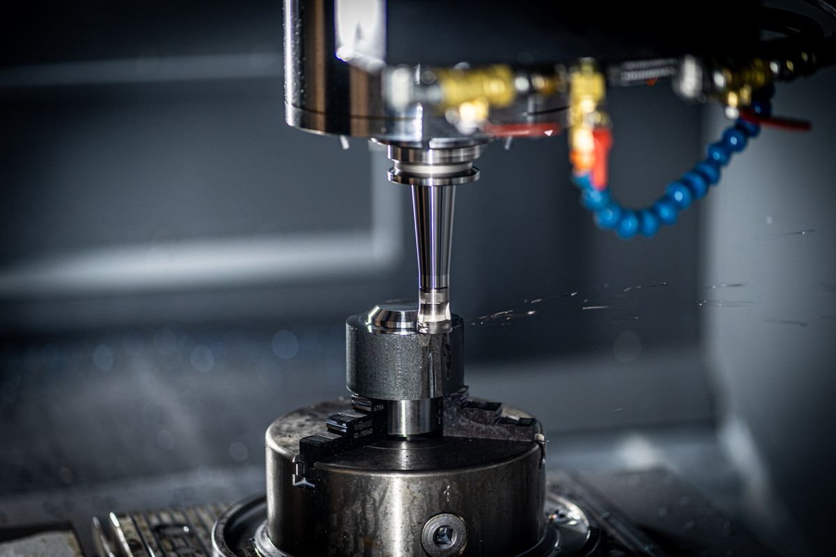 CNC machining centre cutting a metal component